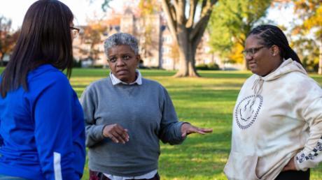 Robin Riley-Casey, co-director of the Emerging Leaders Program, speaks with students enrolled in the program.